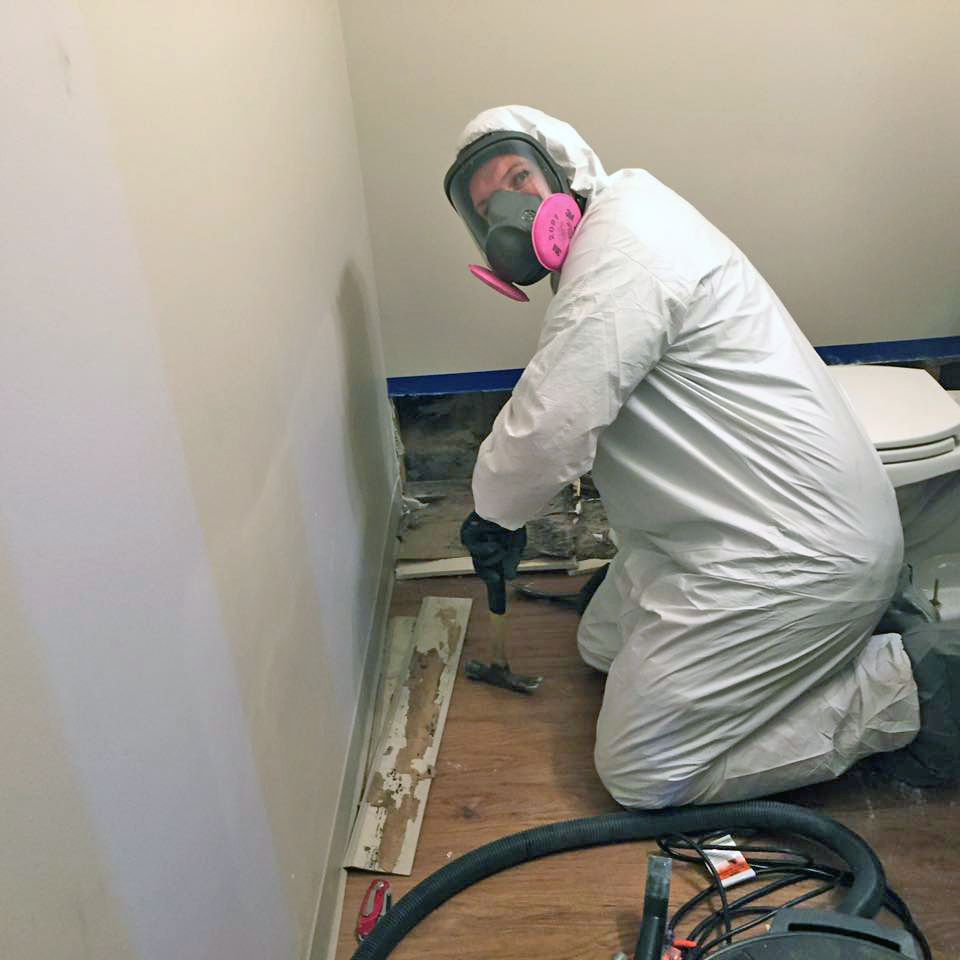 Water restoration franchise Restoration 1 technician at work